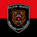 prapor-zvedenoho-zahonu-politsii-skazheni-vedmedi-chervono-chornyi.jpg